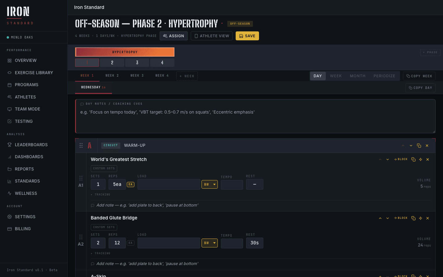Iron Standard Program Builder — week view with supersets, load prescriptions, and per-set volume